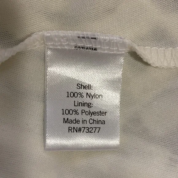 APT. 9 Size 10 A-line off white lace sleeveless 100% nylon dress with lining. - Picture 7 of 7